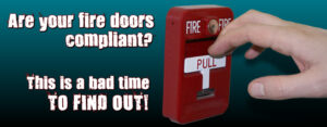 Hand is pulling a fire alarm