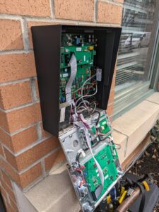 Open callbox, showing the electronics and wires